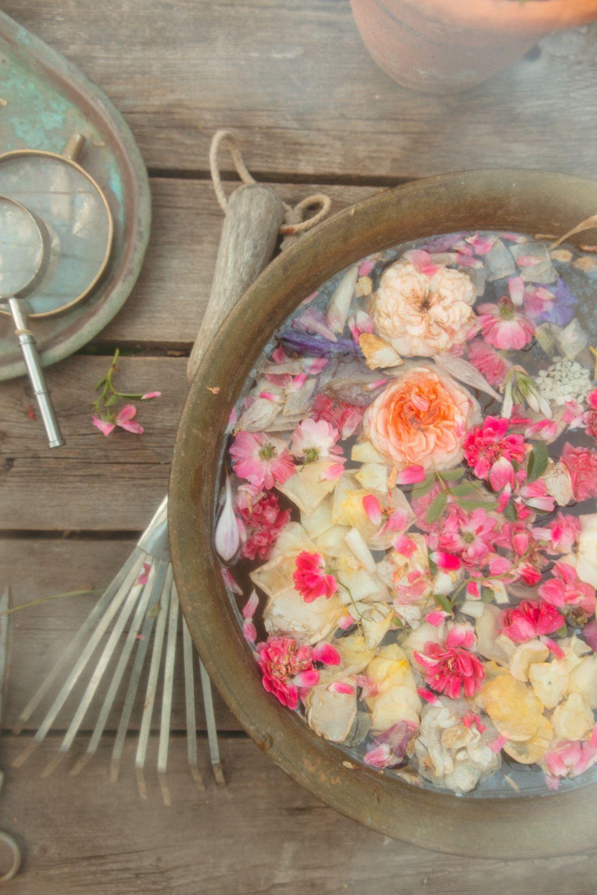 Floating blossoms in a bowl of water