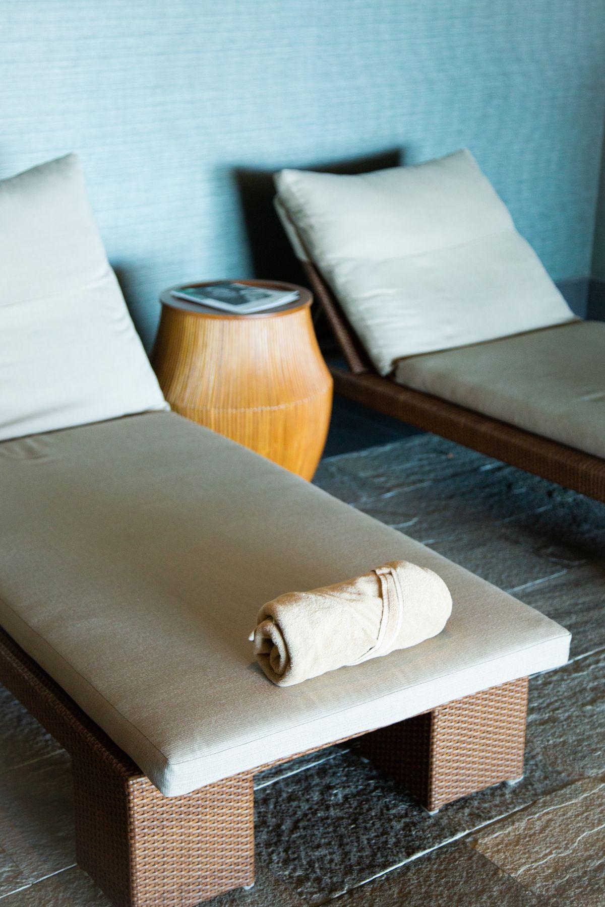 Rattan loungers in a quiet indoor seating area